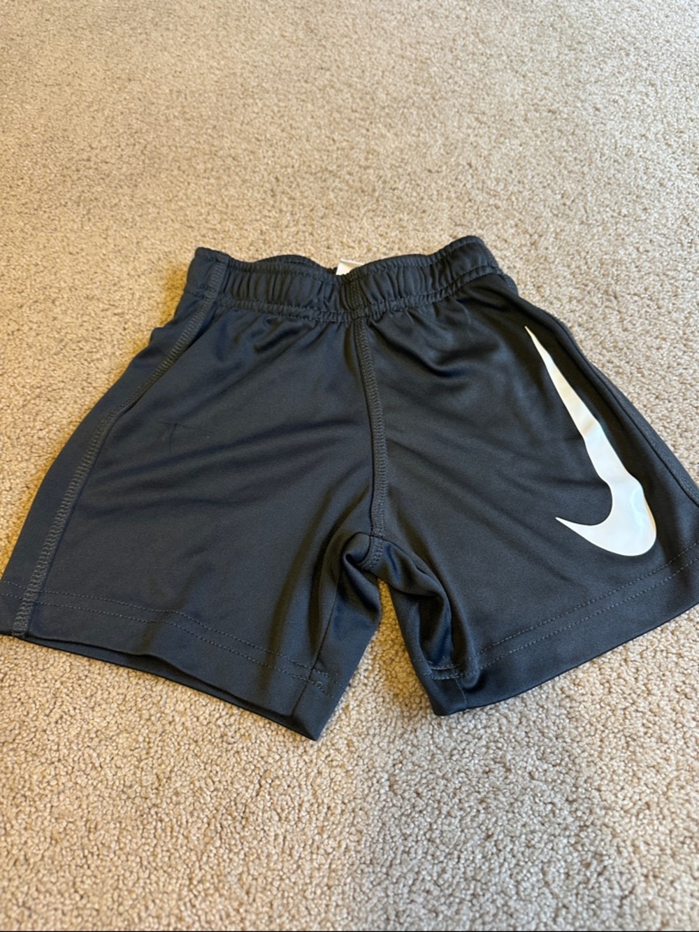 Nike Black Kids Athletic Shorts with White Swoosh Accent